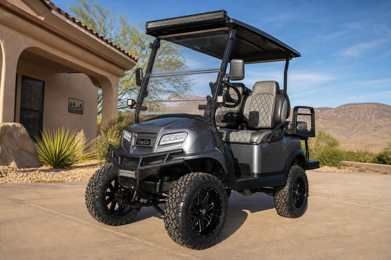 After: lifted Desert Edition Club Car with all-terrain tires and LED lights